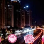 bangalore city street at night with traffic lights and tall buildings : icons for top night activities
